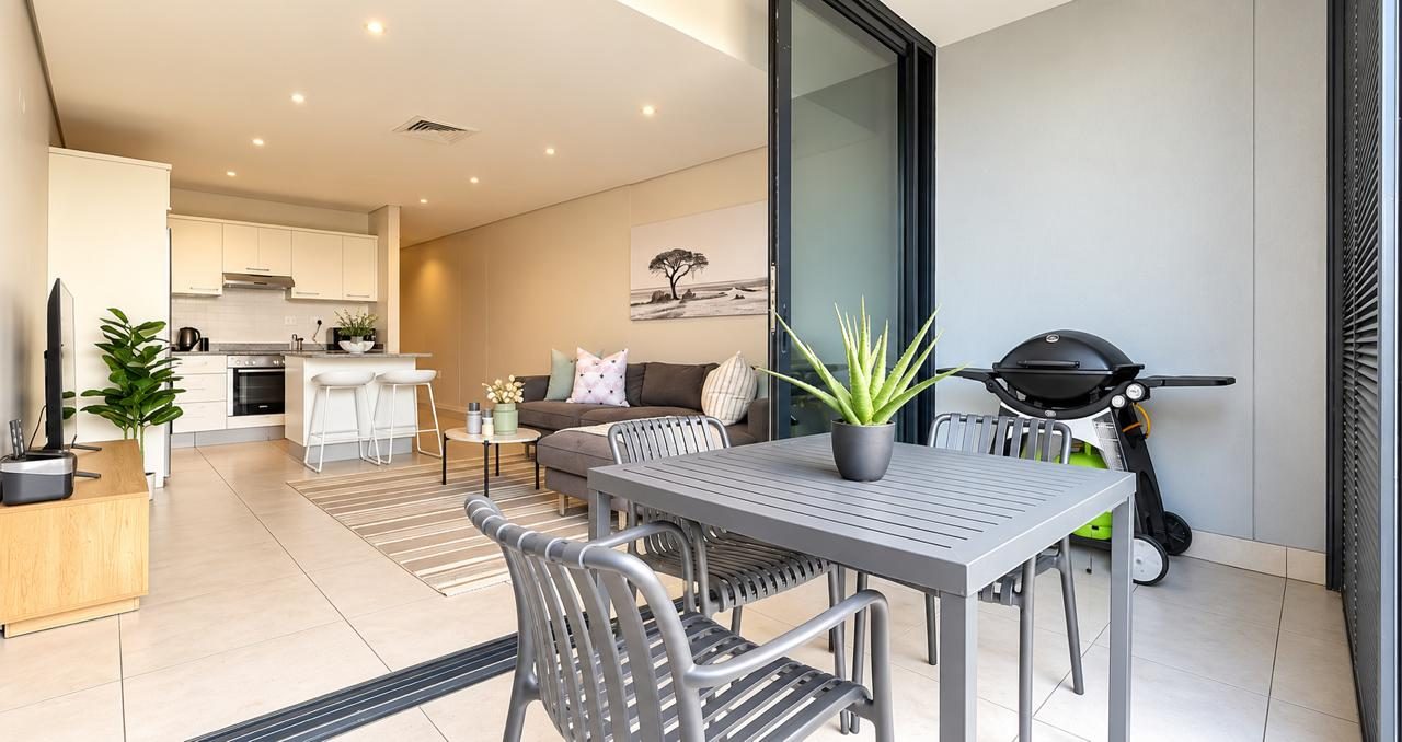 Balcony with dining set and braai